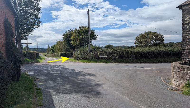 The Millennium Field entrance is just off the lane opposite The Rock Cross Inn.