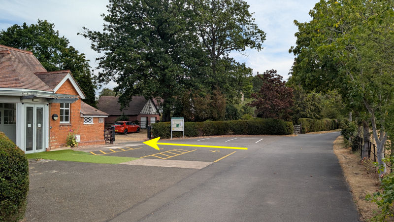 Turn left into the Parish Rooms car park.